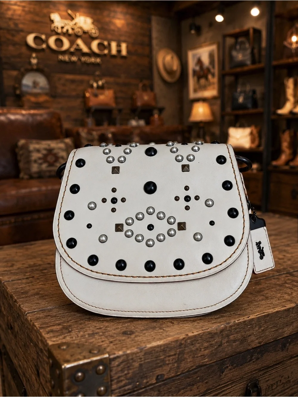 Coach 1941 Western Rivet Saddle Bag, crafted in smooth chalk-white glovetanned